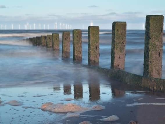 The report warns that England's coast will see a sea level rise of at least one metre at some point in the future