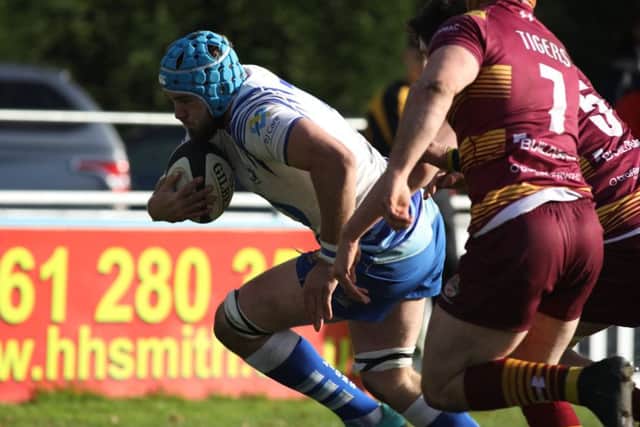 Tom Lewis scores the first Lions try. Picture: Mick Sutterby