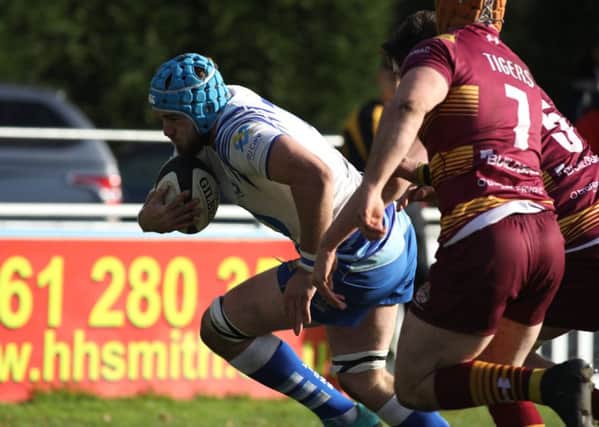 Tom Lewis scores the first Lions try. Picture: Mick Sutterby