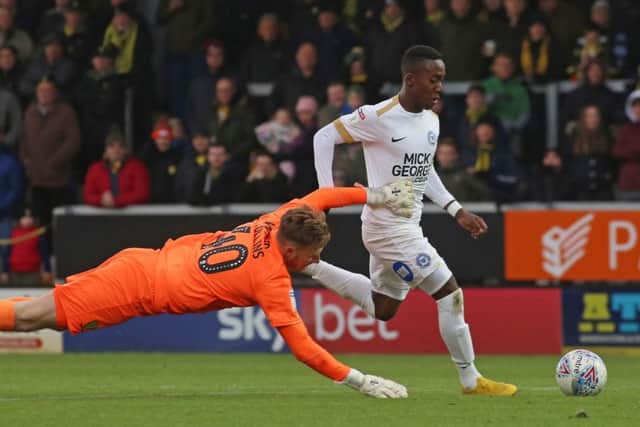 Posh star Siriki Dembele takes the ball round Burton 'keeper Bradley Collins to score his side's second goal. Photo: Joe Dent/theposh.com.