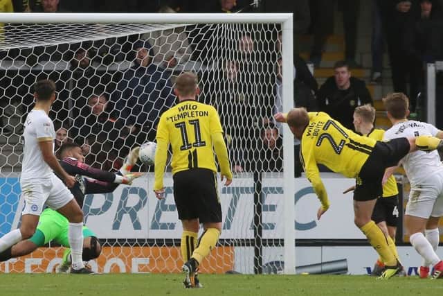 Posh 'keeper Aaron Chapman makes a fine late save to thwart Burton's Liam Boyce. Photo: Joe Dent/theposh.com.