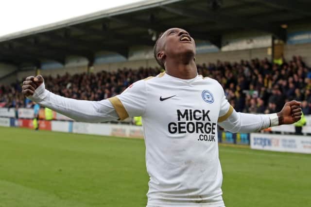 Siriki Dembele celebrates his goal for Posh at Burton. Photo: Joe Dent/theposh.com.