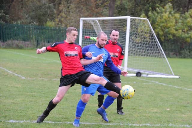 Action from Feeder (blue) 0, Netherton United Reserves 8 in Division Two of the Peterborough League. Photo: David Lowndes.