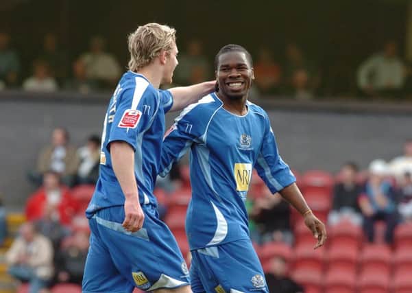 Posh strikers Craig Mackail-Smith and Aaron Mclean celebrate a goal at Grimsby in April, 2008. Posh won 4-1 to make it 11 Football League away games without defeat.
