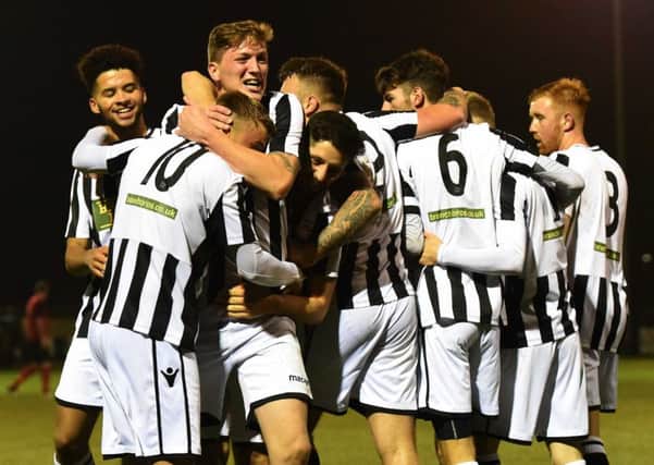 Peterborough Northern Star celebrate their first round FA Vase victory over Sleaford.