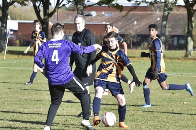 Action from the game between Glinton and Northborough Amber U15s and Malborne Rangers.