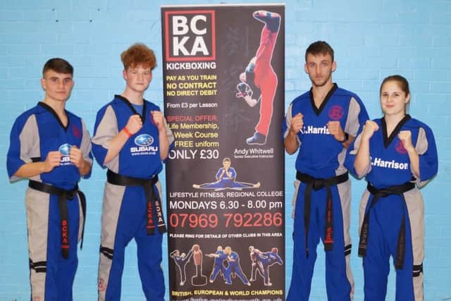 World champion coaches, from the left, Eddy Paddock, Sam Spencer, Leon Gold and Jaden Harris .