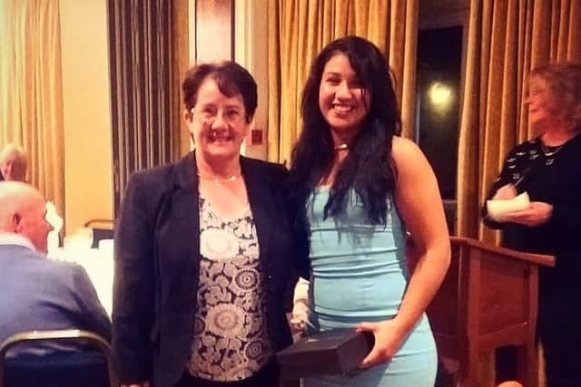 Thalia Martin is presented with the Northants Champion of Champions prize.