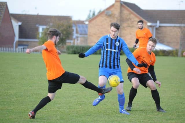 Action from Farcet's 3-2 win over Leverington Reserves (orange).  Photo: David Lowndes.