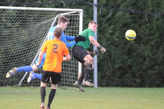 Action from Farcet's Peterborough Junior Cup win over Leverington Reserves.  Photo: David Lowndes.