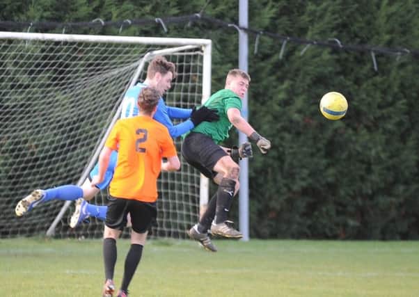 Action from Farcet's Peterborough Junior Cup win over Leverington Reserves.  Photo: David Lowndes.