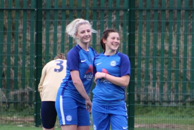 Posh goalscorers Keir Perkins and Jess Driscoll.