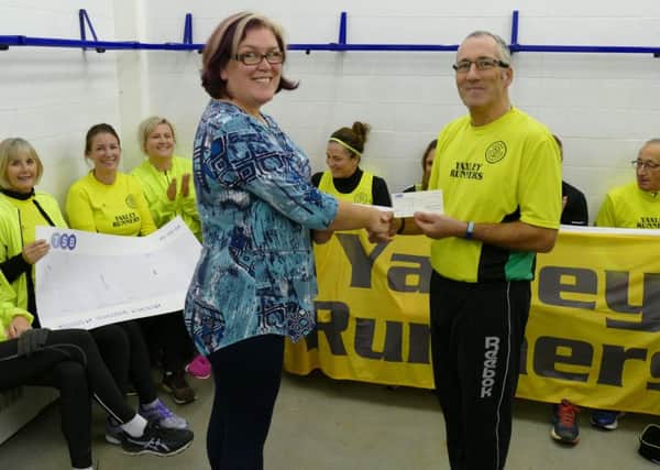 The Yaxley Runners cheque presentation