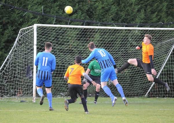 Action from Farcet's 3-2 win over Leverington Reserves in the Peterborough Junior Cup last weekend. Photo: David Lowndes.