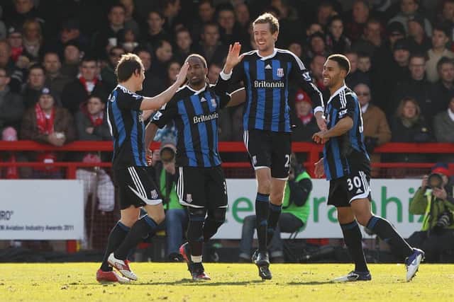 Peter Crouch celebrates a goal for Stoke at Crawley in a 2012 FA cup tie.