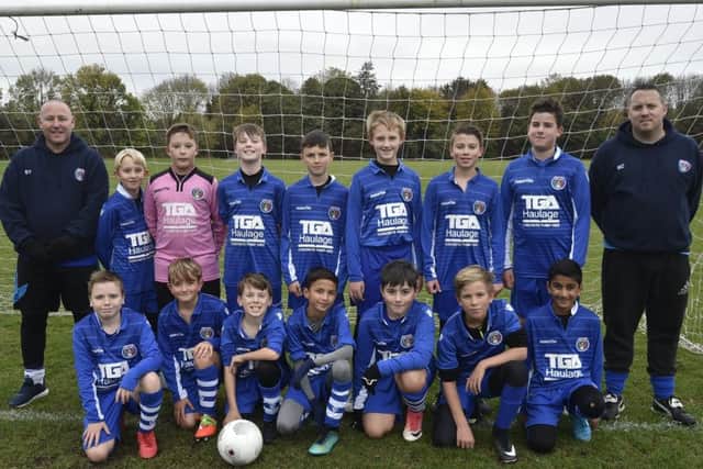 ICA Sports Under 12s are pictures before an 8-0 defeat by Parkside. They are from the left, back, Stuart Young, Alfie King, Tyler Anderson, Joe Cotton, Oliver Allen, Chris Webb, Elliott Rodders, George Laurie, Ben Cotton, front, Harry Young, Lewis Zielski, Jamie Bowles, Harry Dhanushau, Freddie Morrison, Oliver Clifford and Jeevan Modheadio.