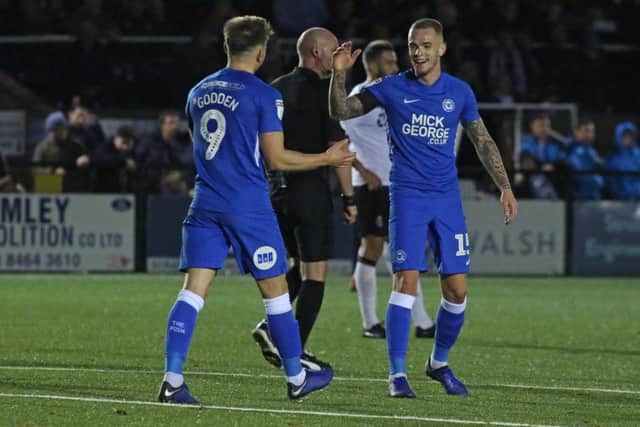 Joe Ward is congratulated after scoring for Posh at Bromley. Photo: Joe Dent/theposh.com.