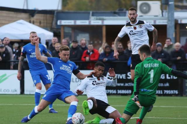 Posh striker Matt Godden in the thick of the action at Bromley. Photo: Joe Dent/theposh.com.