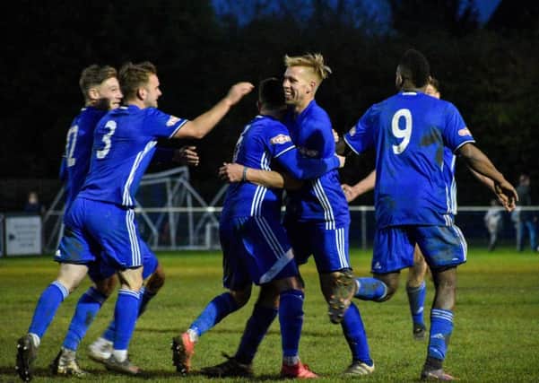 Peterborough Sports celebrate their winning goal against Corby. Photo: James Richardson.