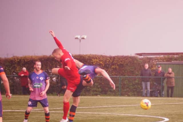 Action from Yaxley's 2-0 win over Wisbech in the FA Trophy. Photo: Graham Langford.