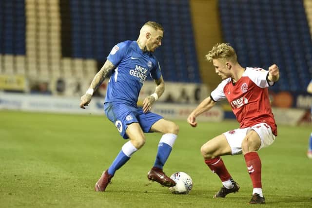 Marcus Maddison is expected to play for Posh against Luton.