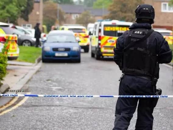 Police at the scene of the stand off in Bretton. Photo: Terry Harris