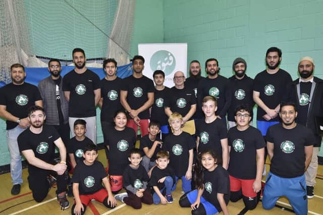 Pictured are members of the Futuwwa Wrestling Club, eight of whom won British Championship medals.