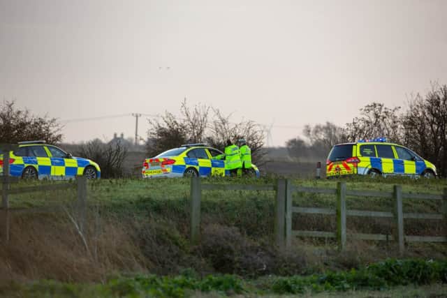 Police at the scene of the collision. Photo: Terry Harris