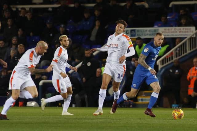 Posh winger Marcus Maddison breaks away from the Luton defence. Photo: Joe Dent/theposh.com.