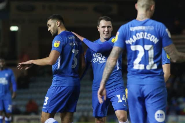Posh celebrate Colin Daniel's (left) goal against Luton. Photo: Joe Dent/theposh.com.