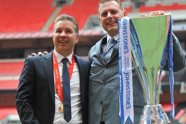 Posh manager Steve Evans wants to take chairman Darragh MacAnthony (pictured here with former manager Darren Ferguson and the Johnstone's Paint Trophy) back to Wembley.