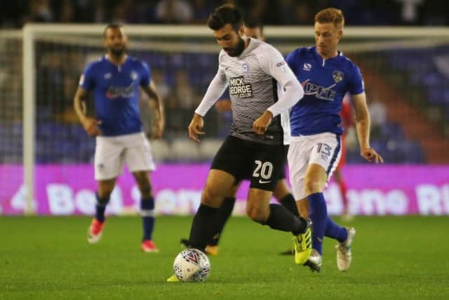 Eoin Doyle playing against Posh for Oldham.