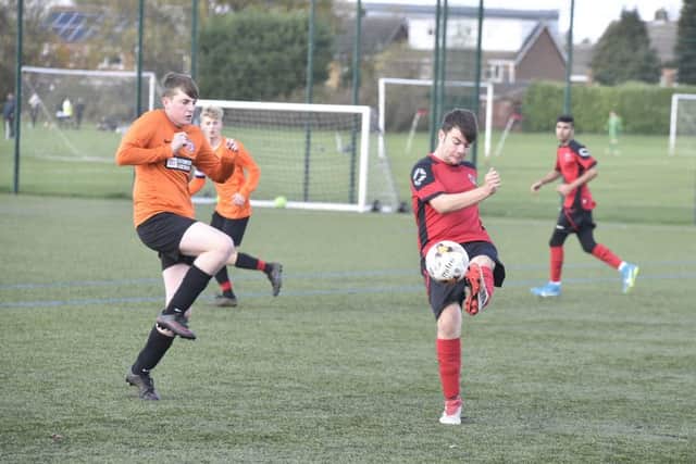Action from the game between Netherton United Under 16s and Thurlby Tigers.