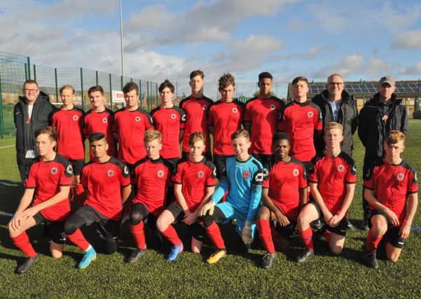 Netherton Under 16s are pictured before beating Thurlby Tigers 2-1 to record their first league win of the season. From the left are, back,  Trevor Sercombe, Mantvydas Bloze, Toby Downes, Dennis Selway, Daniel Laxton, Oliver Sercombe, Filip Czerenkiewicz, Gianmarco Akinyosoye, James OConnor, Matt Downes and Dan Jeeves, front, Oliver Hancock, Muhammed Kafit-Warra Tahir, Samuel Hardy, Samuel Permarker, Ronnie Jeeves, Mutafela Lubinda, Alfred Eager and Toby Munt.