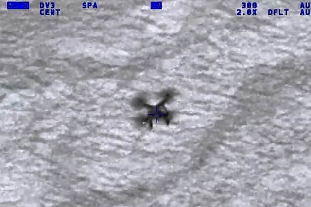 The drone captured by a police camera