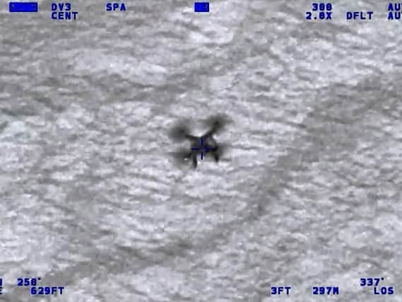 The drone captured by a police camera