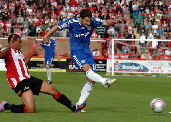 Chris Whelpdale in action for Posh on their last trip to Exeter in 2010.