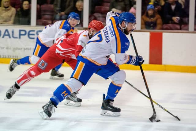 Captain James Ferrara leads another Phantoms attack against Swindon. Photo: Tom Scott.