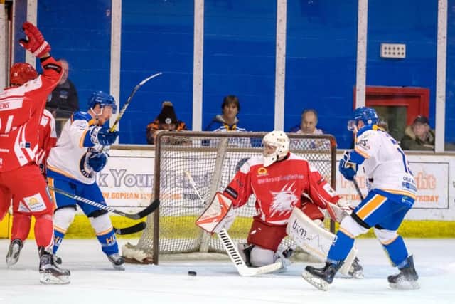 Action from Phantoms (white) against Swindon. Photo: Tom Scott.