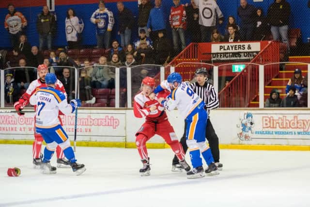 Phantoms' Ales Padelek (white) in a punch-up with Swindon's Sam Jones. Photo: Tom Scott.