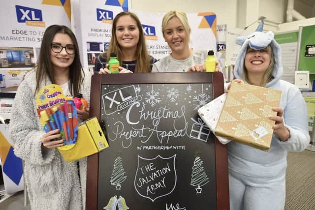 XL DIsplays staff at Orton Southgate launching their Christmas Appeal for the Salvation Army -  Megan Taylor, Emelia Drew, Lisa Hall and Kerry Benton EMN-181116-160211009