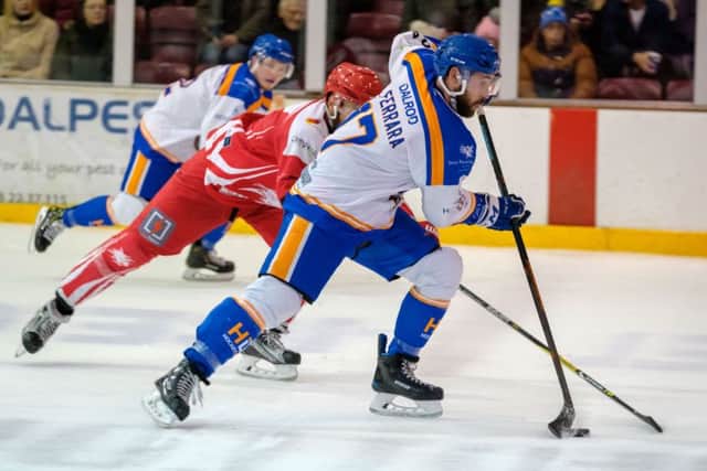 Captain James Ferrara leads another Phantoms attack against Swindon. Picture: Tom Scott