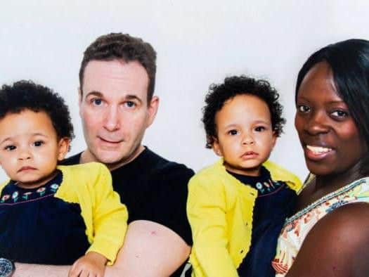 David Dixon-Currie with wife Caroline and their two sons. Photo: SWNS