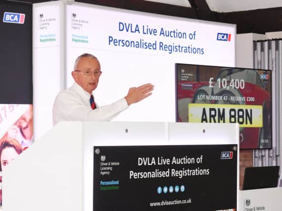 Auctioneer Nick Allison selling ARM 88N - which was eventually sold for Â£12,200