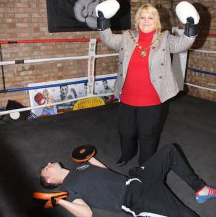 Whittlesey mayor Julie Windle packs a punch at the opening of Whittlesey Amateur Boxing Club's new gym. Picture: RWT Photography