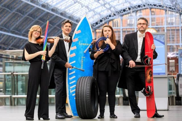 the Lost Property Orchestra featuring the Royal Philharmonic playing an ode to the owners of instruments left behind. Image supplied.