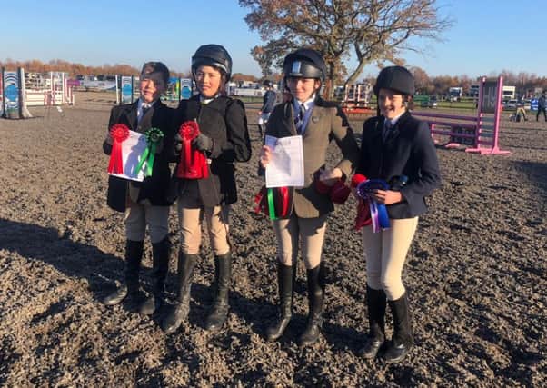 The equestrian team that won the county showjumping title.