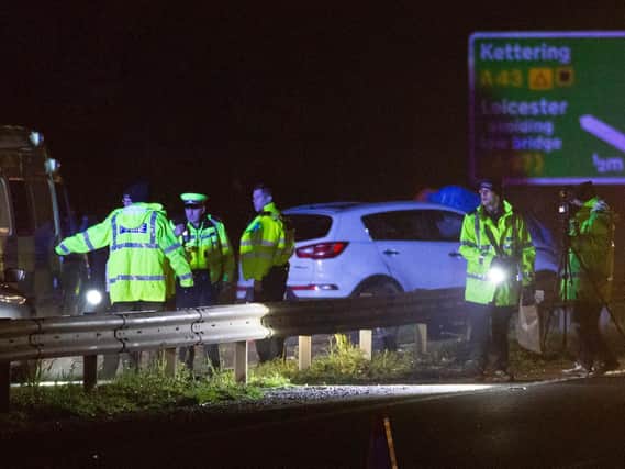 Police at the scene of the crash this evening. Photo: Terry Harris