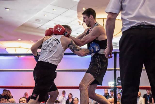 Rich Ellison in action against Joe McNicholas.