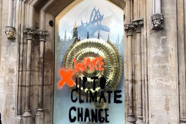 The famous clock defaced by activists. Photo: SWNS